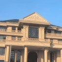 武威黄金麻别墅外墙干挂石材效果示例