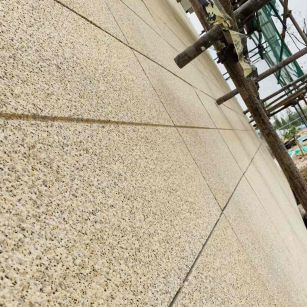 武威 黄金麻花岗岩荔枝面外墙干挂石材效果示例