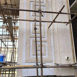 武威 黄金麻花岗岩别墅外墙干挂回纹造型效果