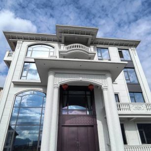 武威白麻别墅外墙干挂石材效果示例