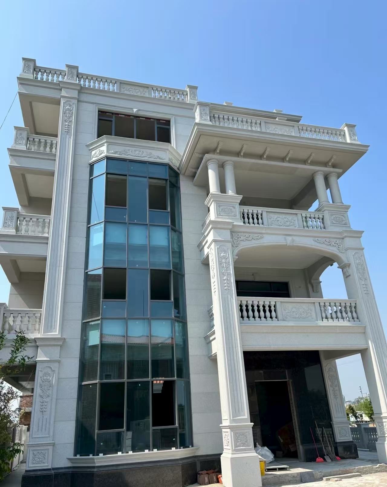 武威 白麻花岗岩别墅外墙干挂效果展示