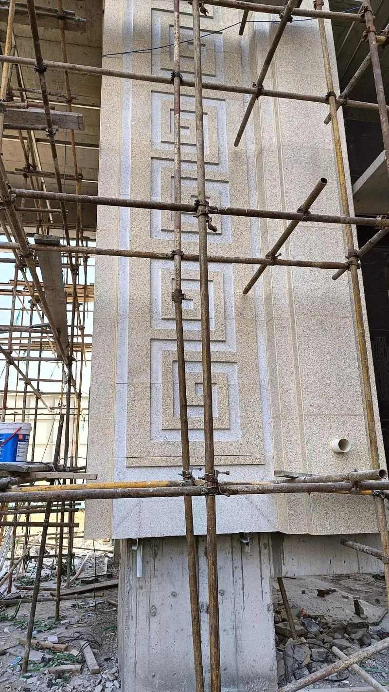 武威 黄金麻花岗岩别墅外墙干挂回纹造型效果